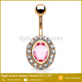 Pink Oval Cubic Zirconia Setting Clear Gems On Rims Gold Plated Surgical Steel Belly Ring